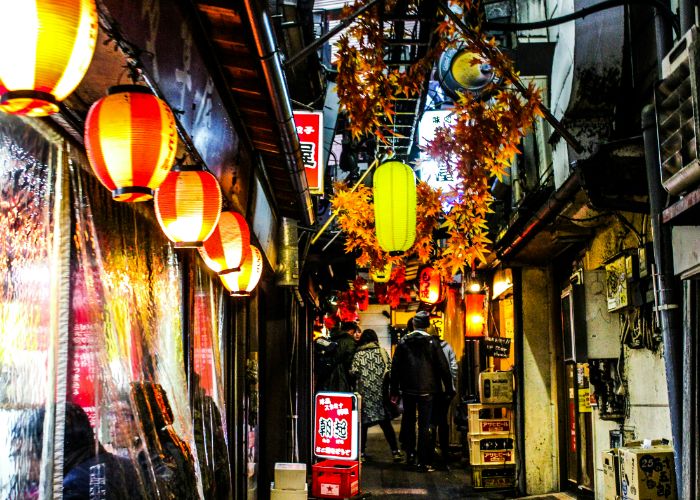 Looking down the crowded bar alley of Golden Gai.